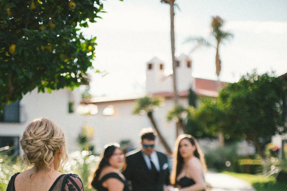 Bride looking at family