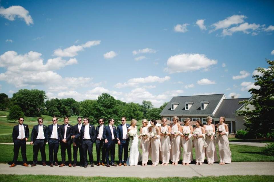 Newlyweds, bridesmaids, and groomsmen