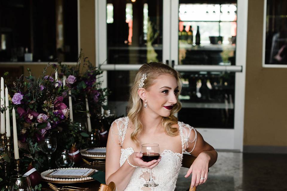 The bride holding her wine