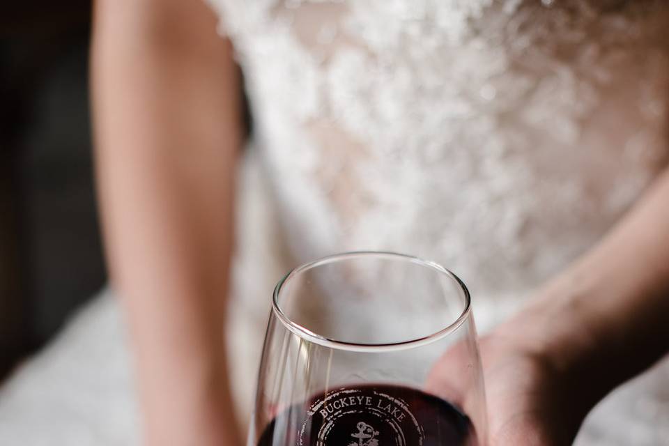 The bride holding her wine