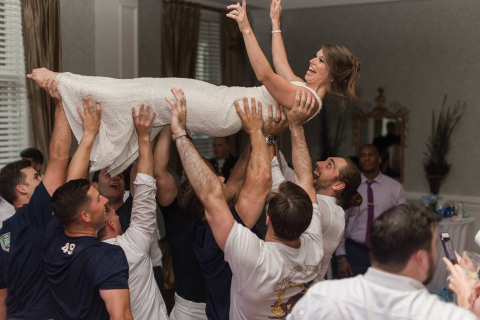 Lifting the bride