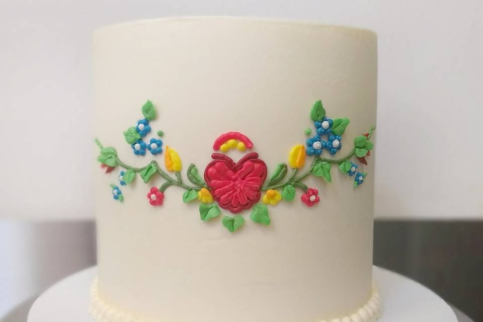 Hand-piped buttercream floral