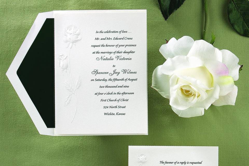 Red Roses Wedding Invitations - Two shimmery red foil roses with glossy black stems interlock above your names to beautifully close this natural white z-fold invitation.  Folded size: 6 5/8