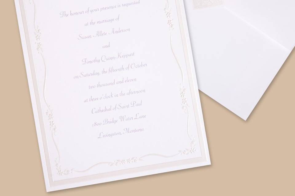 Love Struck Wedding Invitations - Silver-embossed hearts sweetly highlight your names at the top of this non-folding bright white invitation. Your wording is showcased beneath the design for a heartfelt introduction to your special day.  Card Size: 5