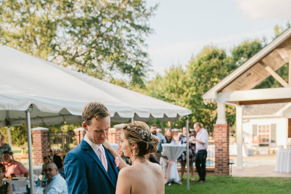 The bride and groom dancing