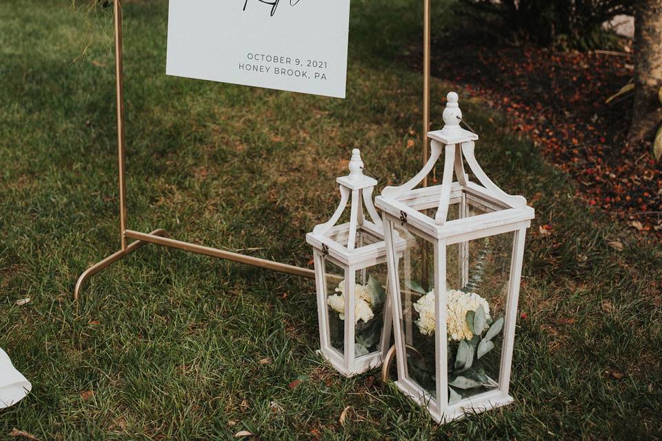 Gold Welcome Sign + Lanterns
