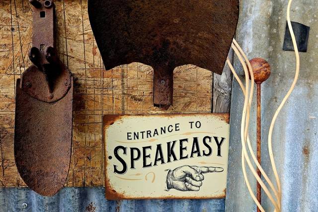 Speakeasy entrance sign