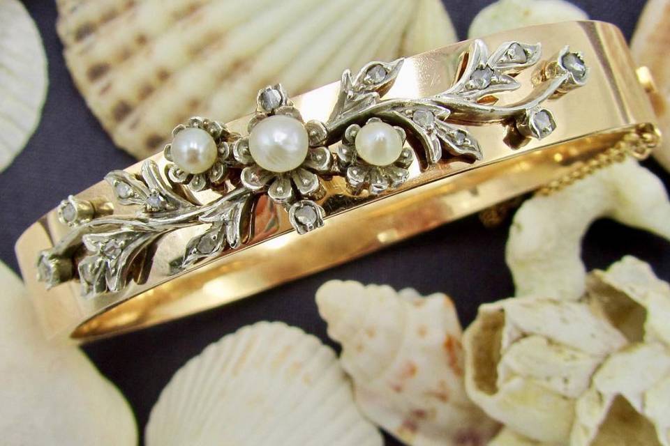 Stunning antique bridal bracelet featuring pearls and rose cut diamonds.