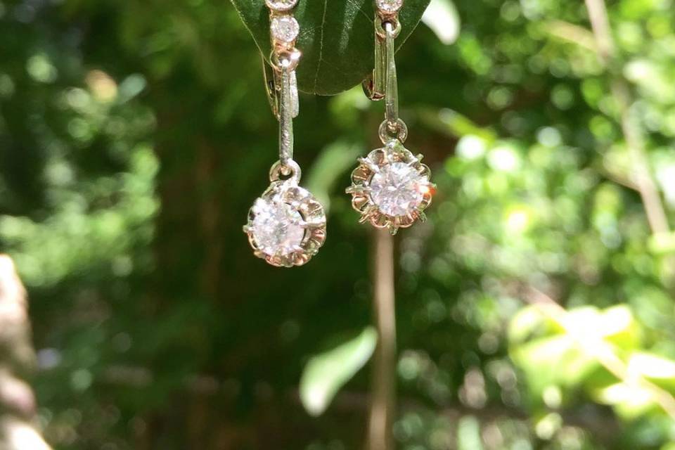 Antique French diamond, gold, and platinum dangle earrings.