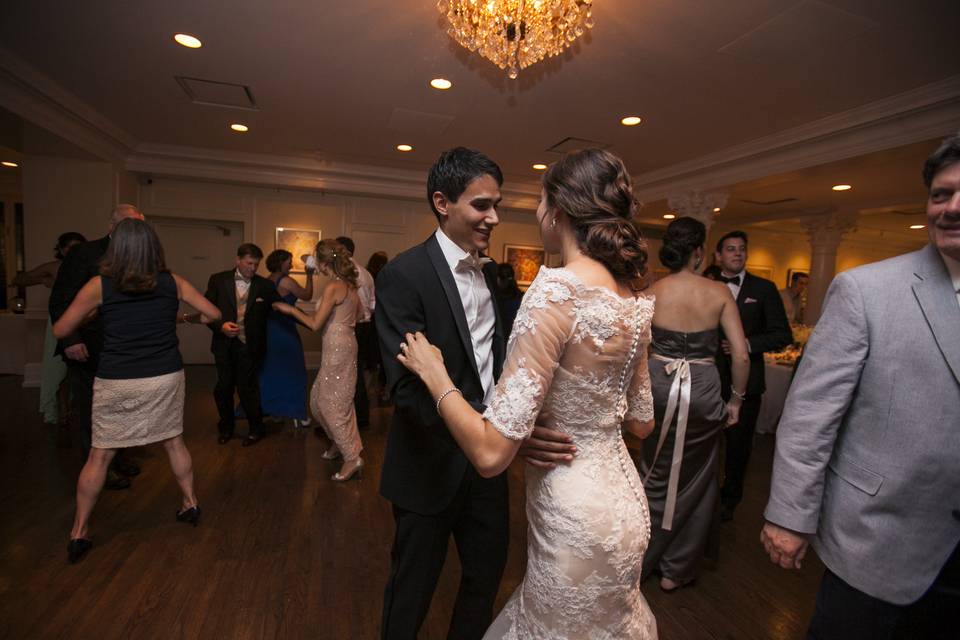 Couple and guests dancing