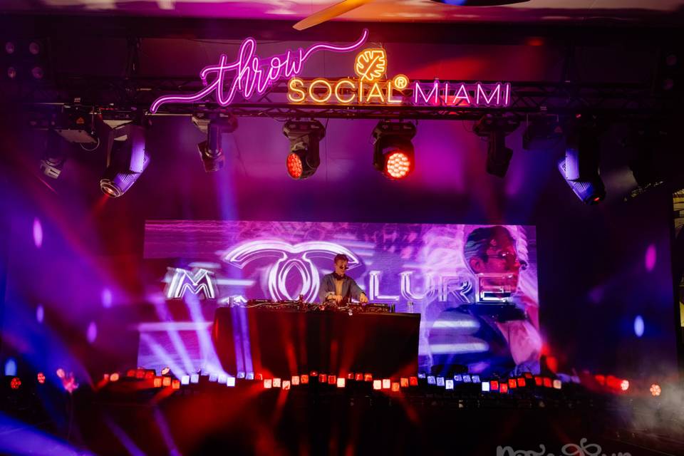 DJ on Stage in Courtyard