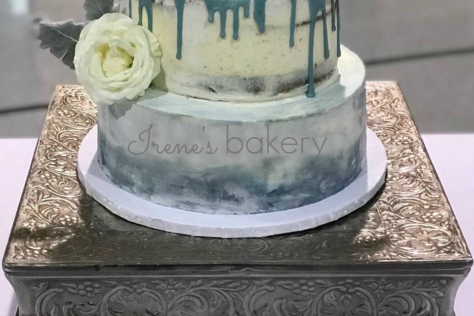Dust blue semi naked wedding cake