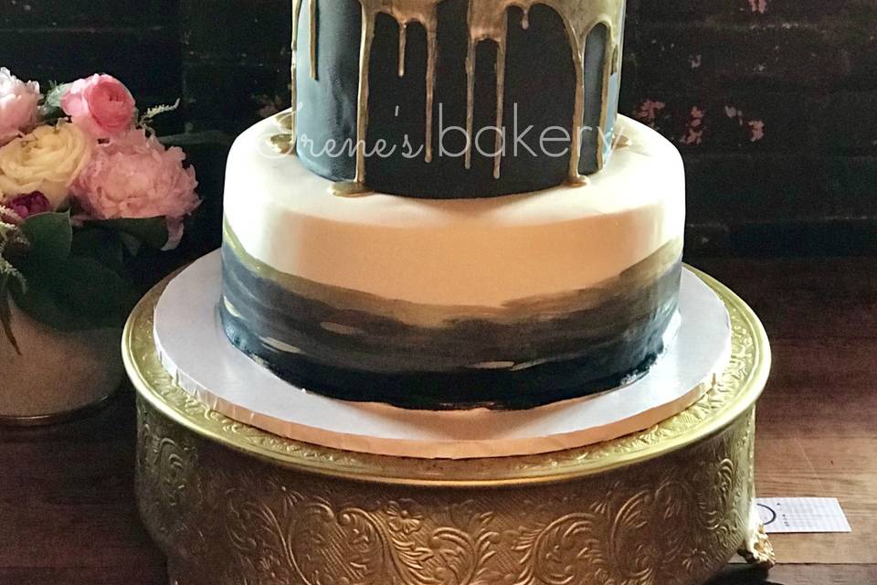 Black cake with gold drips