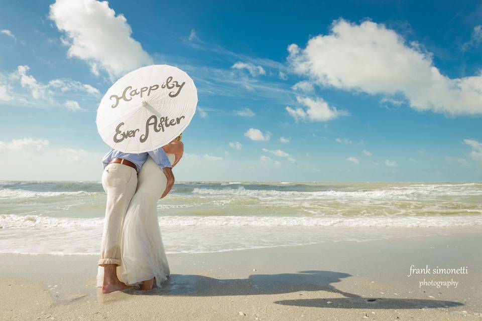 Newlyweds by the sea