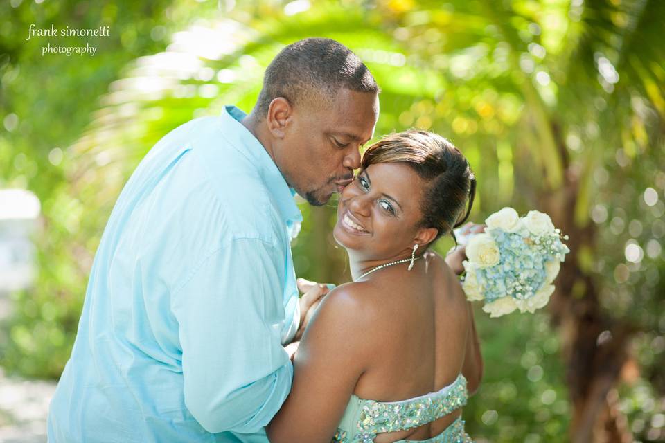 Groom kisses his bride