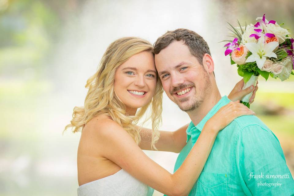 Bride holding her groom