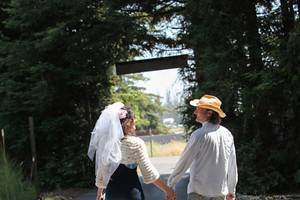 Couple leisurely walk hand in hand​