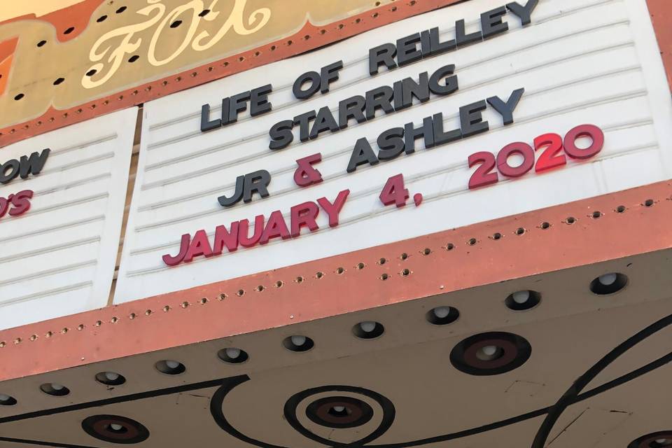 Newlyweds on marquee