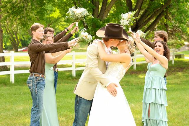Bride and groom kiss