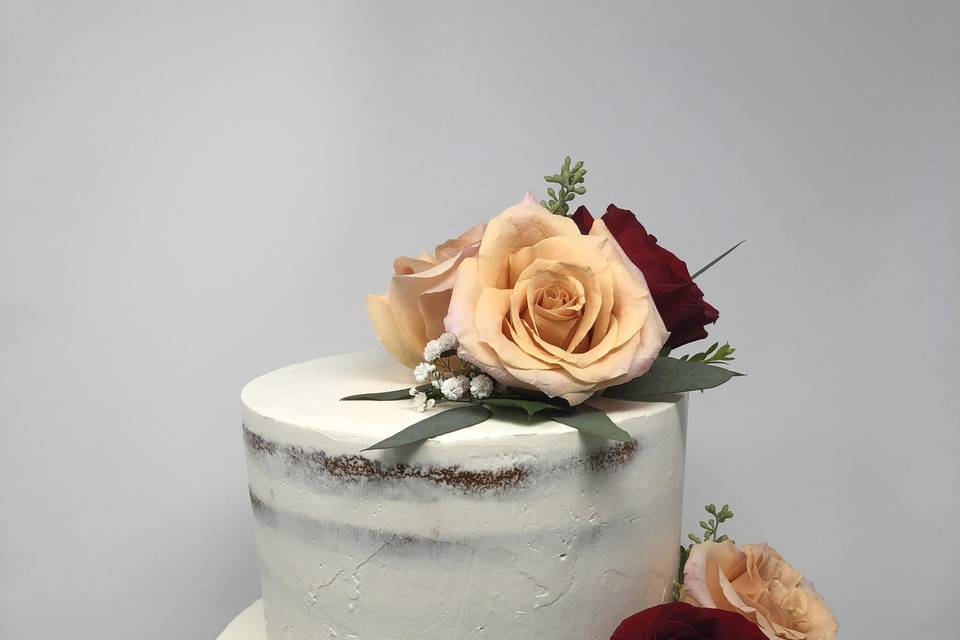 Naked cake with fresh flowers