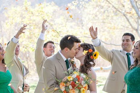 bride and groom showered with rose petals by bridal party at autumn-inspired Gardener Ranch Wedding Carmel Valley  | Buena Lane Wedding Photography