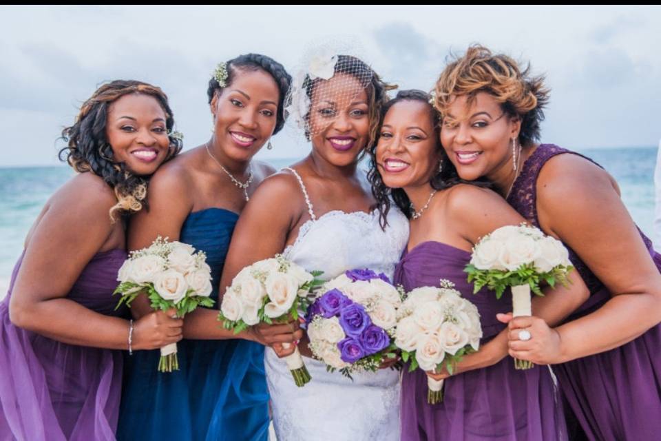 Bride with her maid of honor and bridesmaids
