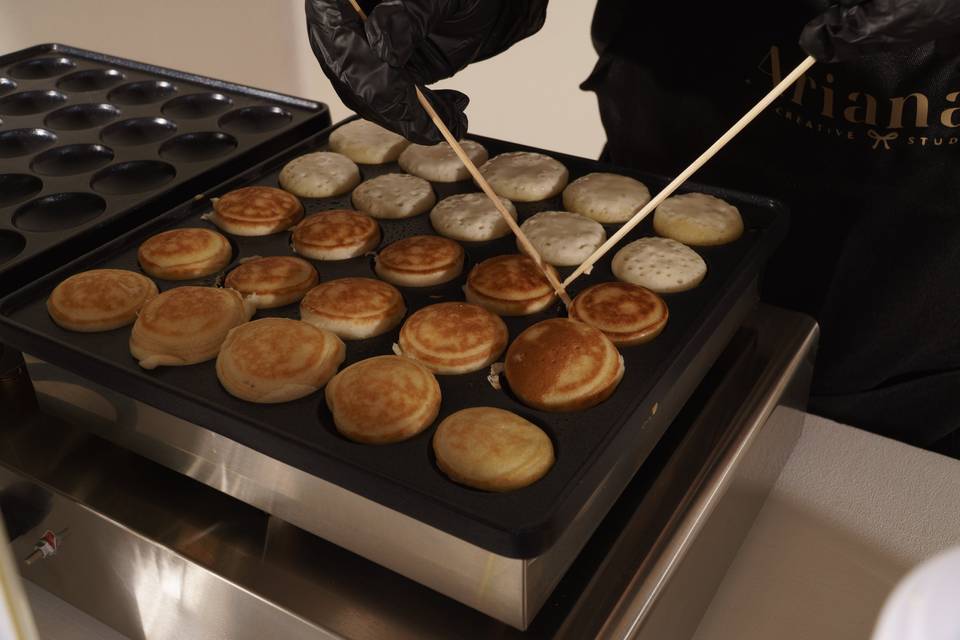 Flipping pancakes on griddle