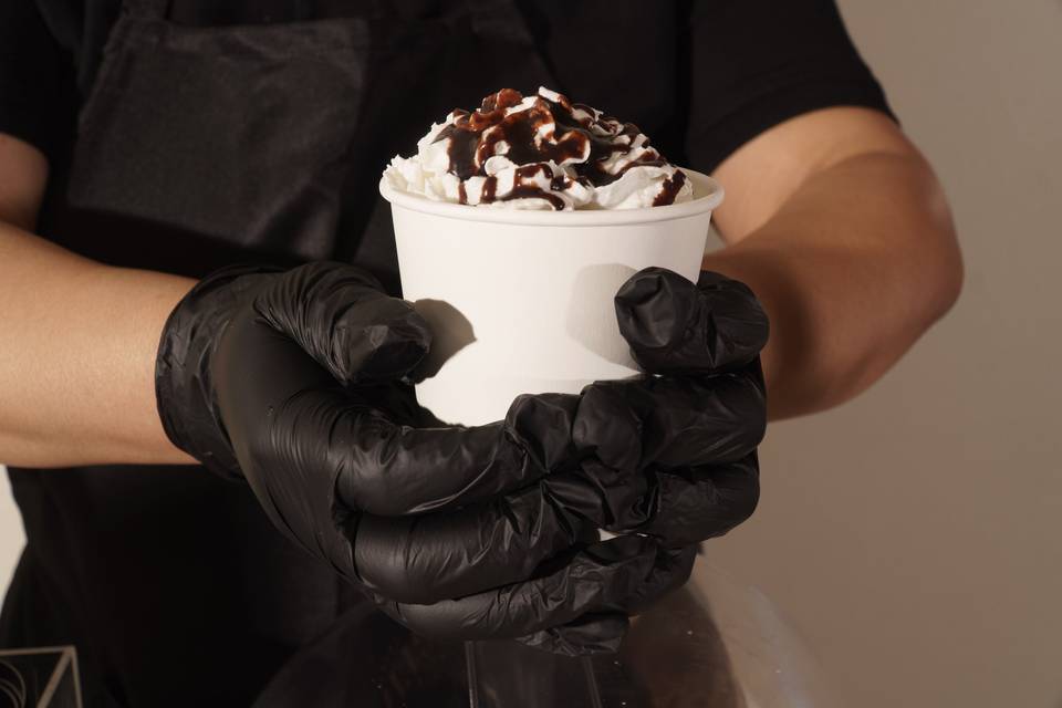 Holding a cup of hot chocolate