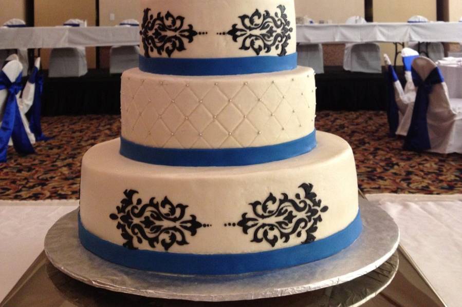 Wedding cake with blue ribbon bands