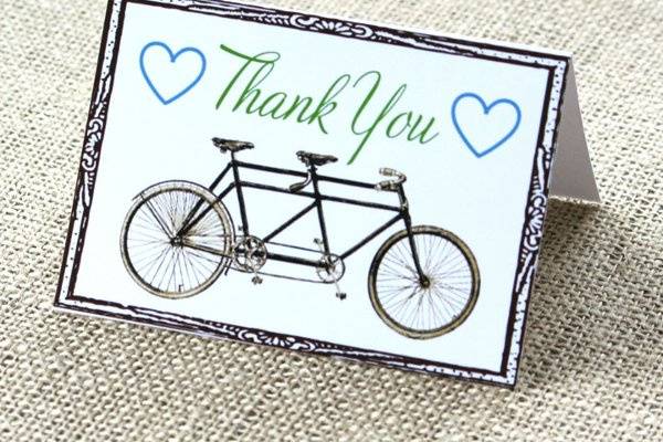 Send your guests this thank you card featuring a vintage tandem bike.