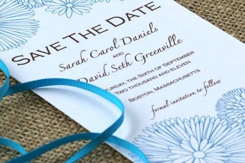 This long save the date card features pretty rustic flowers.