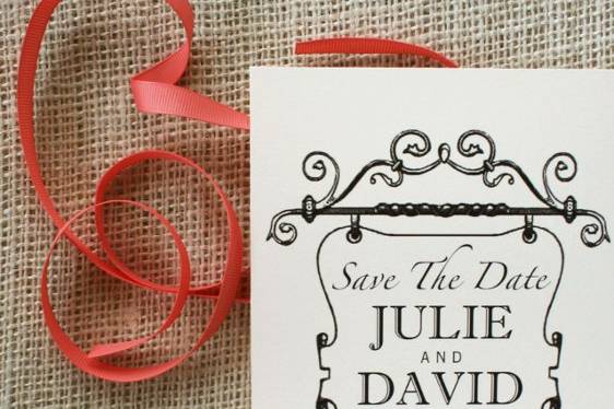 A vintage sign is featured in this modern vintage save the date card.