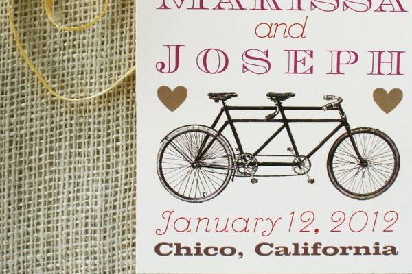 A vintage tandem bike is featured in this rustic save the date card