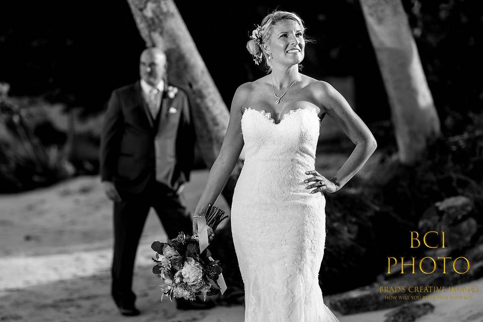 Stunning bride and groom in this black and white high fashion image taken just before walking down the aisle