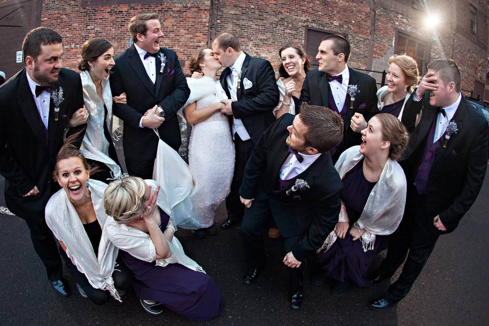 The couple with the bridesmaids and groomsmen