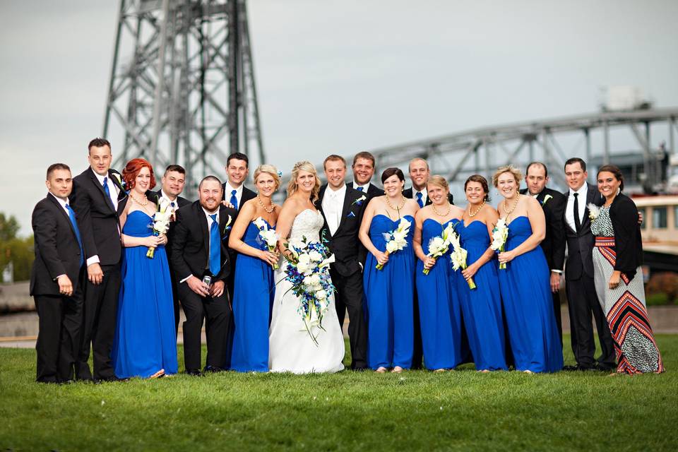 The couple with the bridesmaids and groomsmen