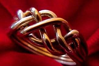 Puzzle Rings by Norman Greene
