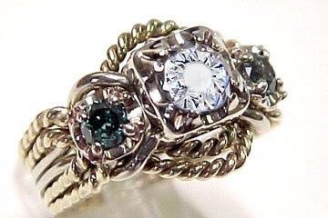 Puzzle Rings by Norman Greene