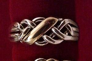 Puzzle Rings by Norman Greene