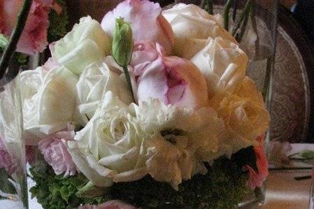 October wedding with garden roses rannunculus and lisianthus hand wrapped