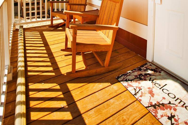 Romantic porch of the Finnegan Cottage with a privacy screen and a view to die for!  Couples or singles massage available.