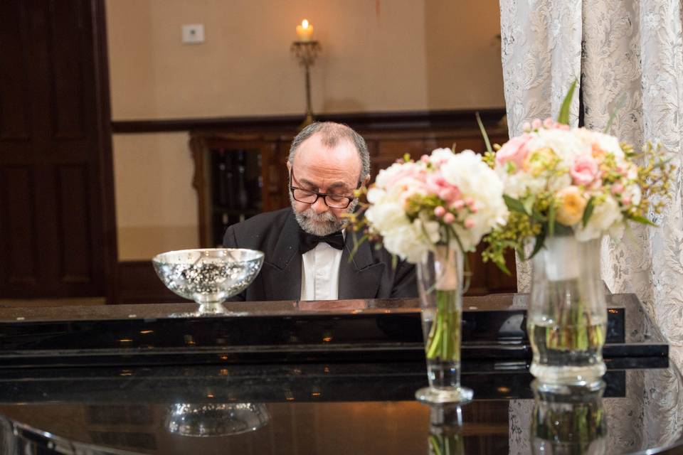 Our in-house pianist can be hired by the hour.