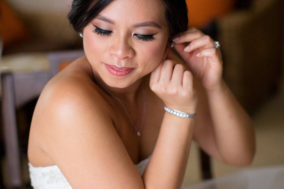 Bride wearing her earing