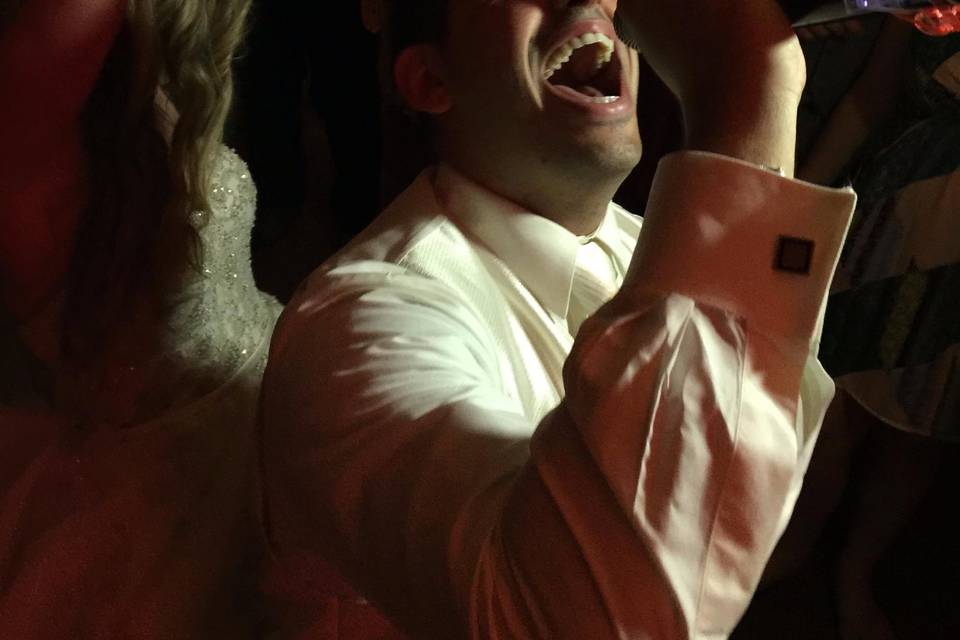 Groom sings along