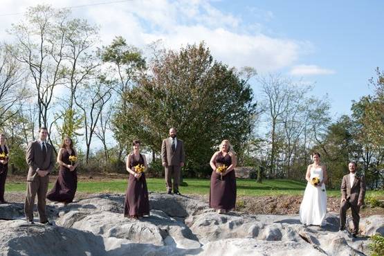 The couple with the bridesmaids and groomsmen