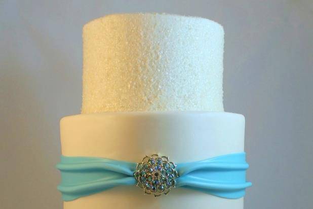 Four-layered cake with ribbon