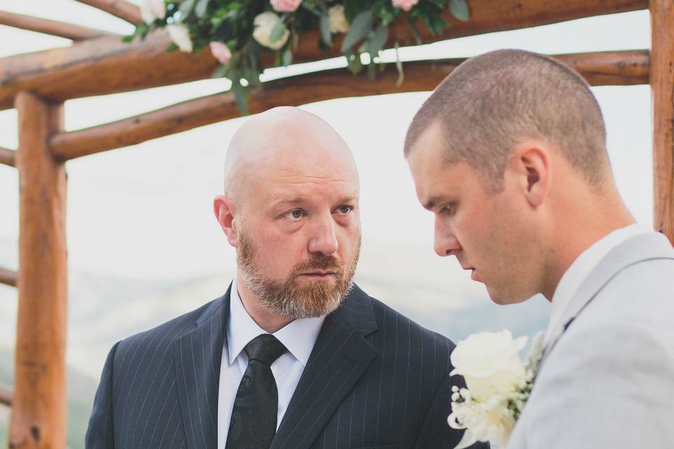 Last minute wedding ceremony notes. Photo by Kelly Costello Photography.