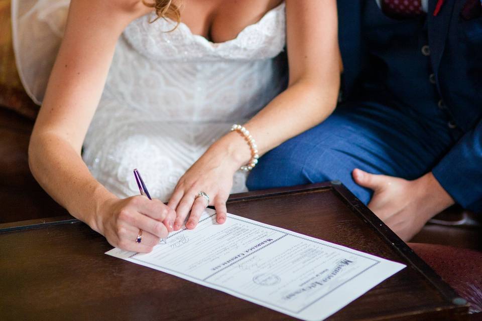 Signed, sealed and delivered. Photo by Ashley Kidder Photography.