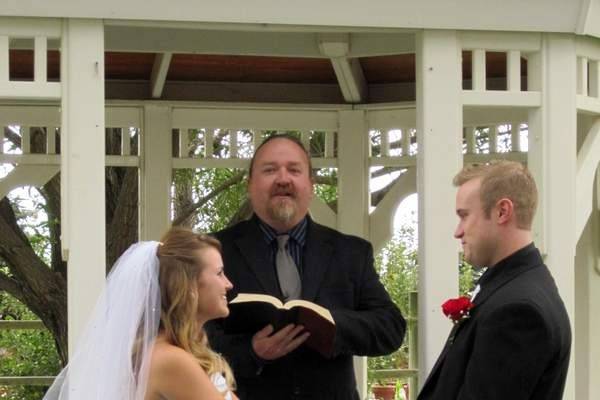 A happy young couple getting married at Anderson Farms.