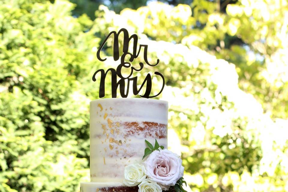 Nearly naked cake with florals